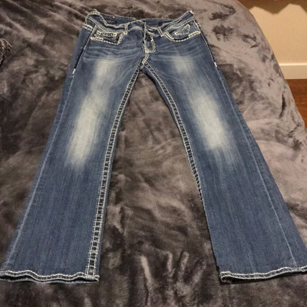 Vigoss jeans with sequin rhinestone pocket detail.